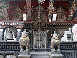 Kathmandu Patan 02-4 Rato Red Machhendranath Temple North Doorway Guarded By Two Snow Lions 